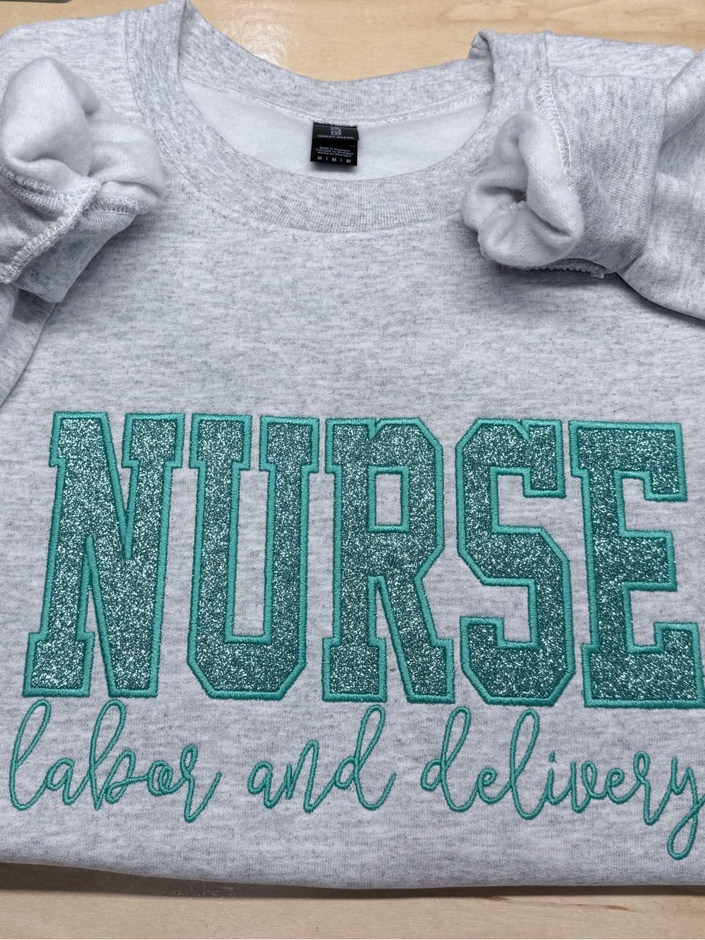 Gray Sweatshirt with Teal 'NURSE' Glitter Applique